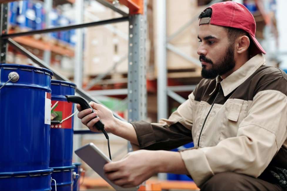 stock image of a man working on a factory 