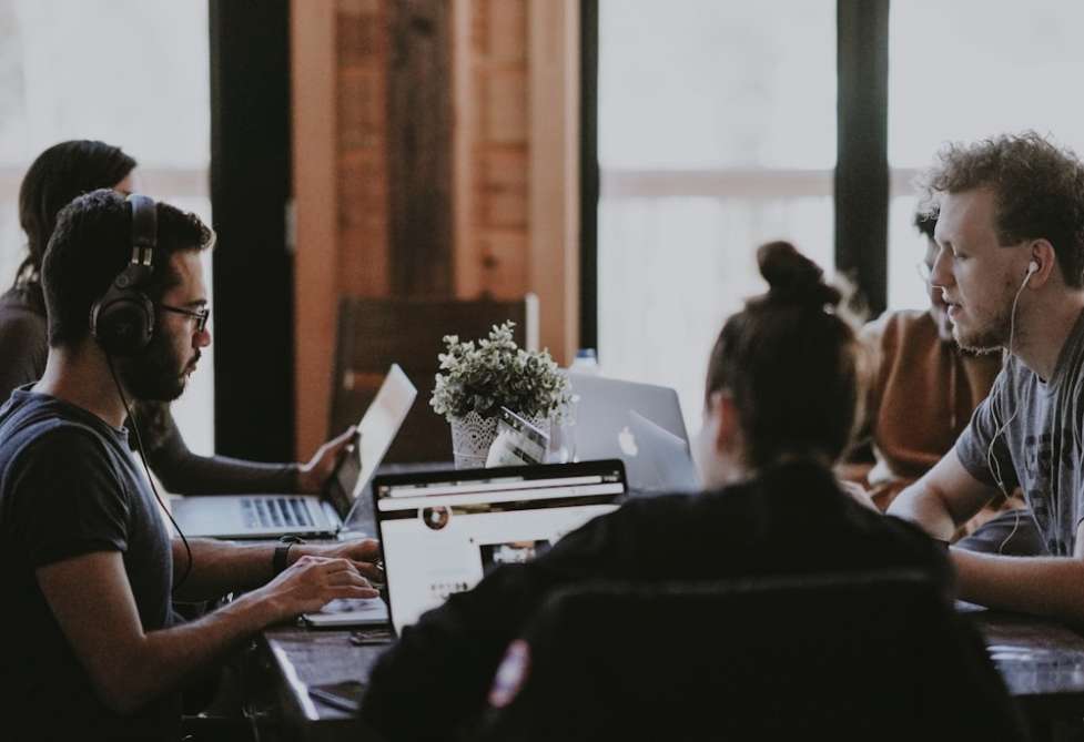 people working on a office together 