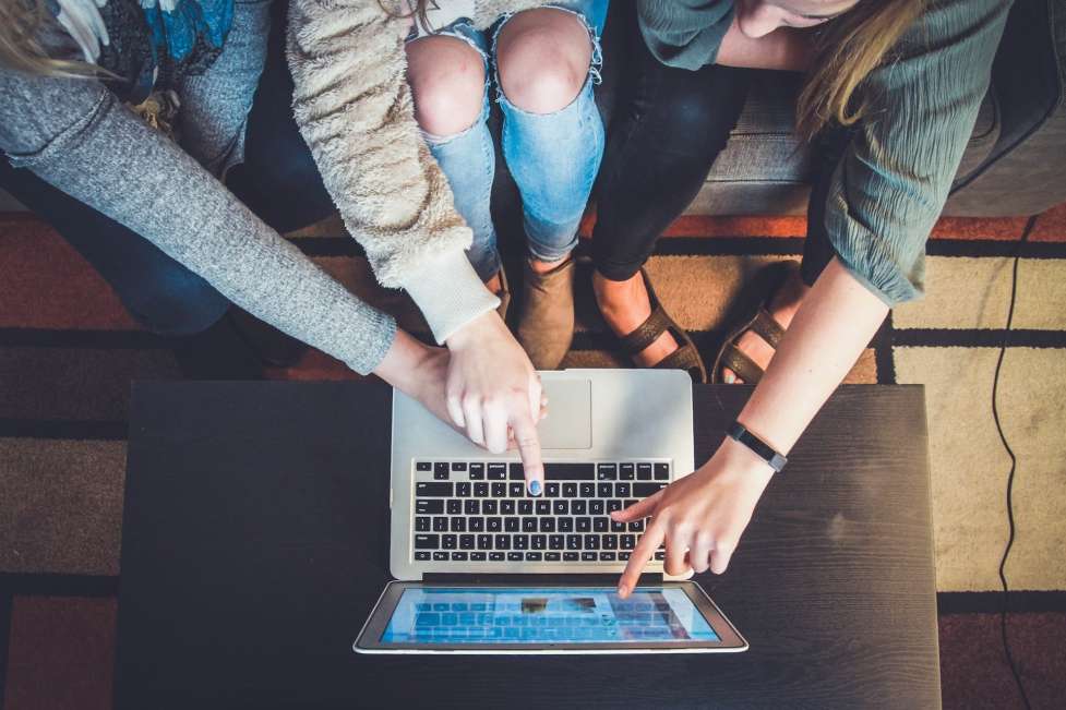 stock image of some people working together 