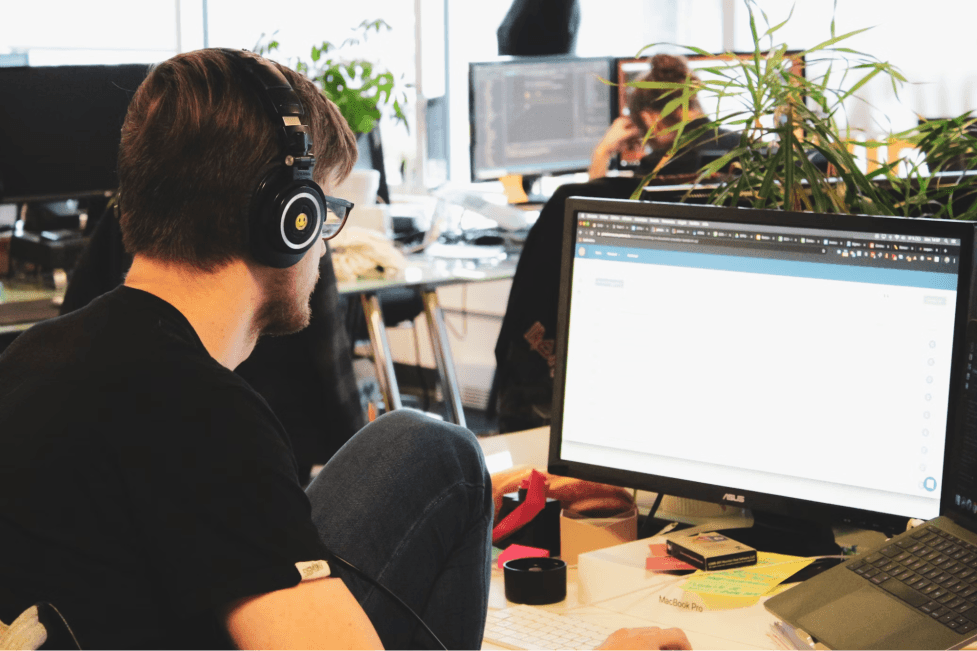 stock image of a person working on a computer 